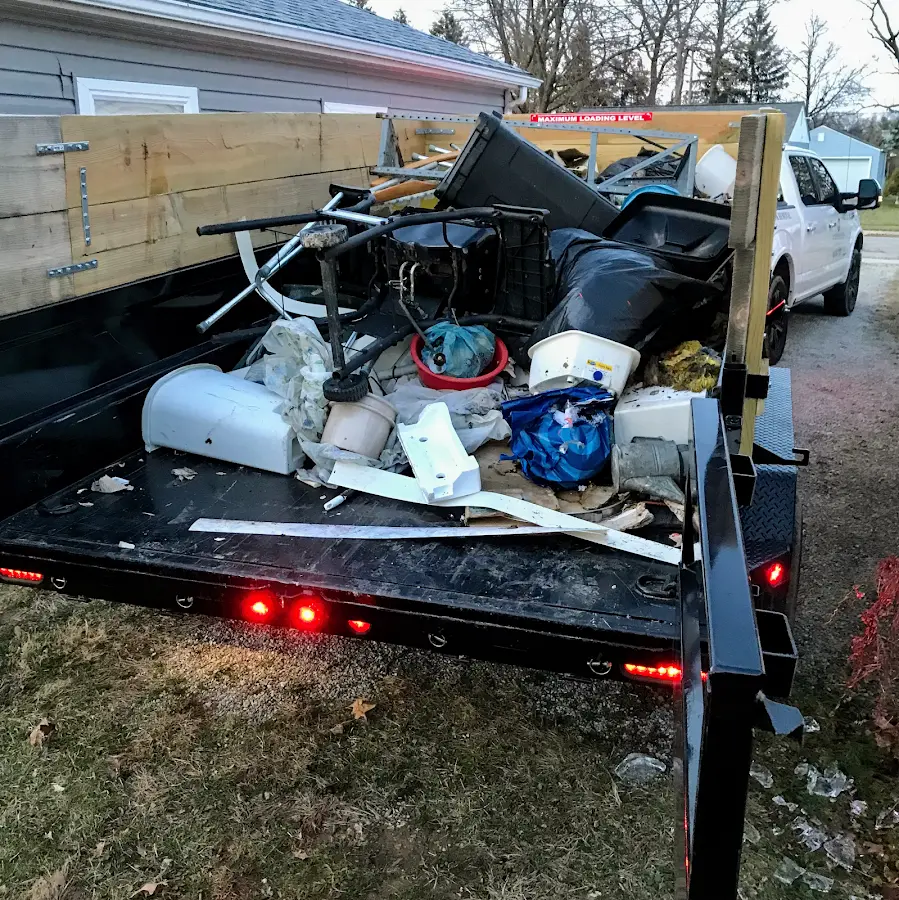 Roll-off dumpster delivered to a residential driveway in Crockett
